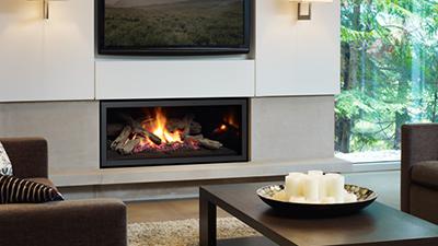 Large direct vent fireplace, 40" wide with clean edge installation or with a surround. This unit has a glowing ceramic firebed and logs. Colder climates will benefit from intense radiant heat and built in blower.