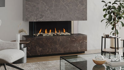Large fireplace with a 50" linear burner. The clean uninterrupted view of the flame is enhanced by three sides of viewing and is zero clearance for design flexibility. It can be framed in as a corner unit as well and direct vent and power vent are available.