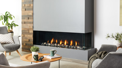 Large fireplace with a 60" linear burner. The clean uninterrupted view of the flame is enhanced by two sides of viewing and is zero clearance for design flexibility.