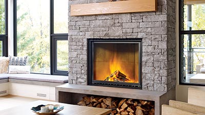 Designed to showcase the dynamic ambiance of a wood burning fire. Featuring the largest glass area on a Regency wood burning fireplace, with a full guillotine door and screen. This decorative wood burning appliance is EPA Exempt.