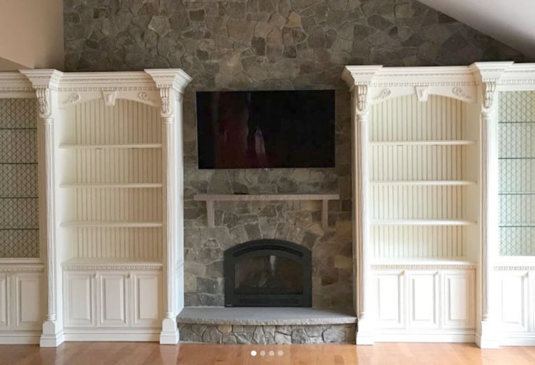 Regency P90 Gas Fireplace, shown with stone and custom cabinets