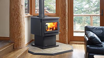 F2400 wood stove with black pedestal & black contemporary door