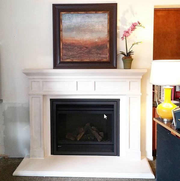 Regency P36 gas fireplace, shown with white mantel